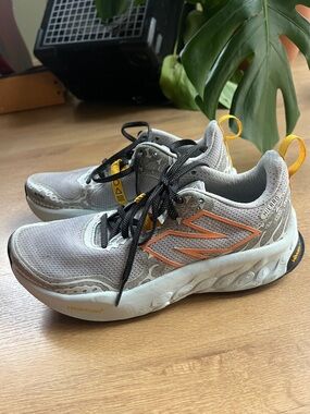 New Balance Grey/Blue Running Sneakers with Yellow Accents